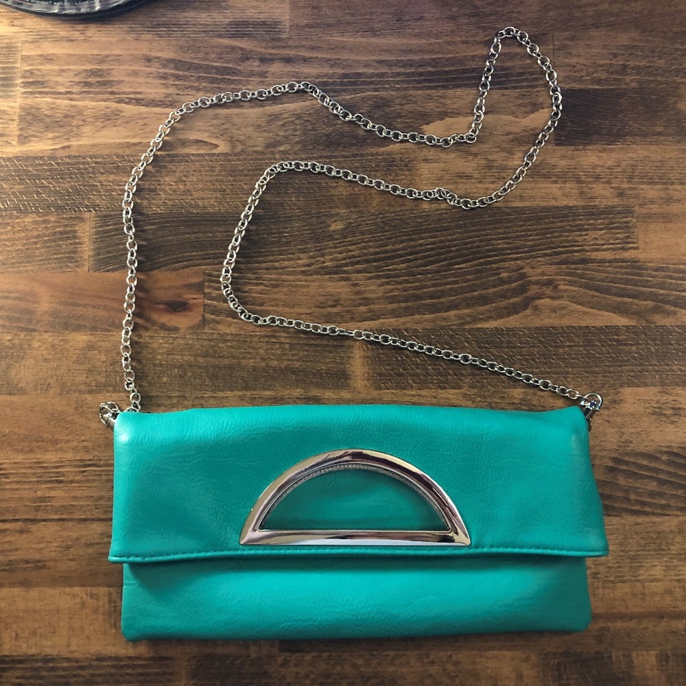 $5 items to be removed June 2026 - Charming Charlie Over the Moon clutch